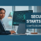 Real early-career cybersecurity professional at a security dashboard with shields and a network map, preparing for the CompTIA Security+ SY0-701 certification